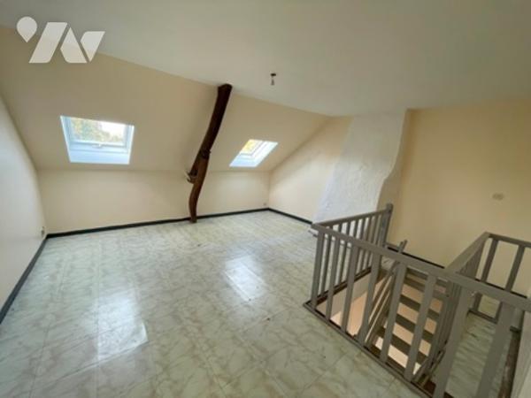 UNE MAISON A USAGE D'HABITATION