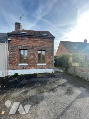 UNE MAISON A USAGE D'HABITATION