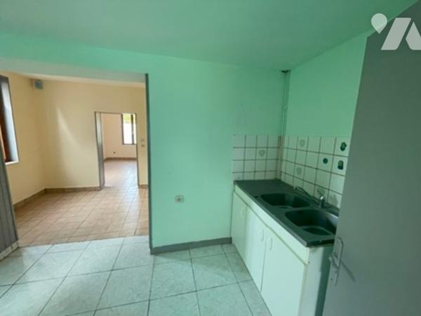 UNE MAISON A USAGE D'HABITATION