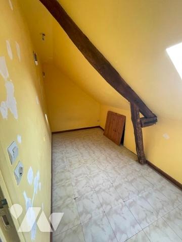 UNE MAISON A USAGE D'HABITATION