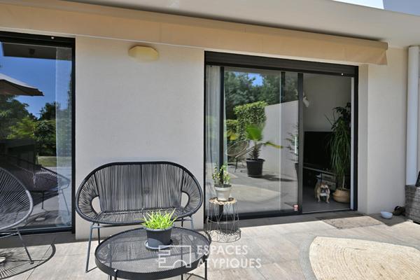 Appartement en rez-de-jardin aux airs de maison individuelle