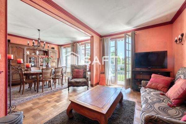 Maison familiale avec beau jardin