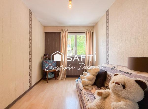 Maison avec terrasse et balcon et garage double