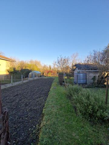 Maison de 81 m², garage 40 m² et jardin de 453 m²