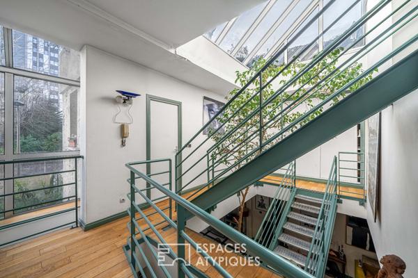 Maison au style industriel avec terrasse sur le toit à Maison Blanche