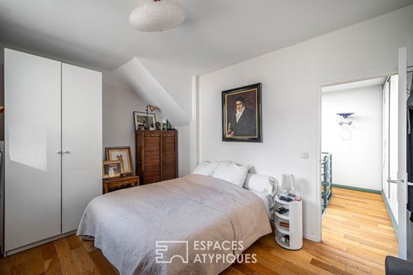 Maison au style industriel avec terrasse sur le toit à Maison Blanche