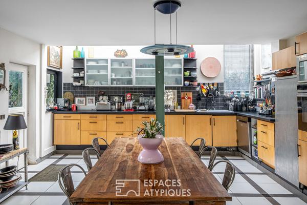 Maison au style industriel avec terrasse sur le toit à Maison Blanche