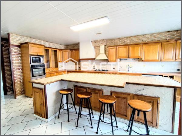 Maison individuelle de semi plain pied plus de 119m2 de semi plain pied,4 chambres, jardin clos et garage