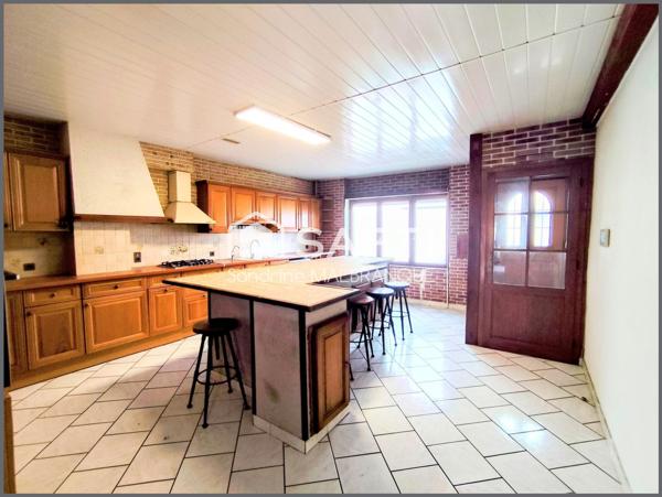 Maison individuelle de semi plain pied plus de 119m2 de semi plain pied,4 chambres, jardin clos et garage