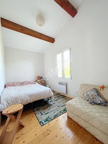 Ensemble de deux logements indépendants sur terrain arboré dans un environnement calme