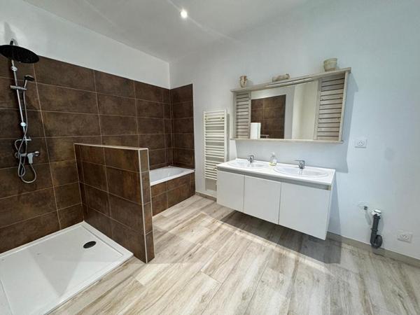 Appartement rénové ? Rez-de-jardin + Garage