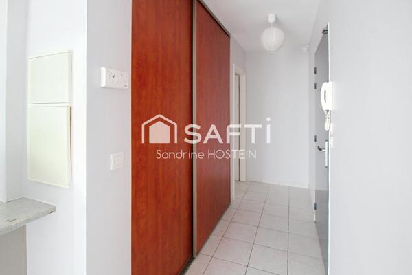 Joli appartement de 70m2 avec terrasse, cave et places de stationnements