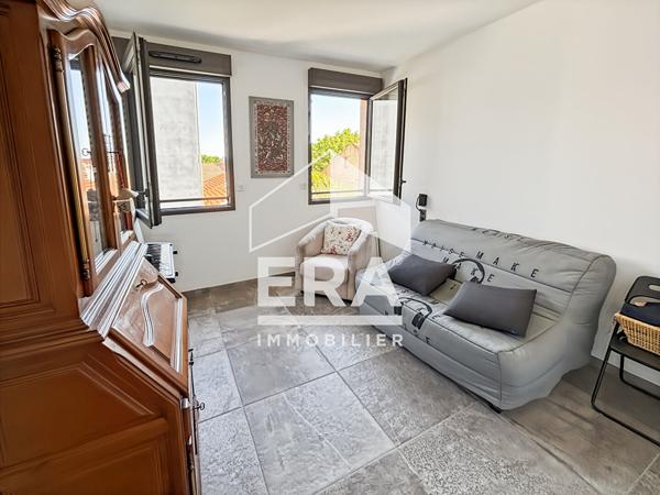 Appartement unique avec ascenseur terrasse et 2 places parking