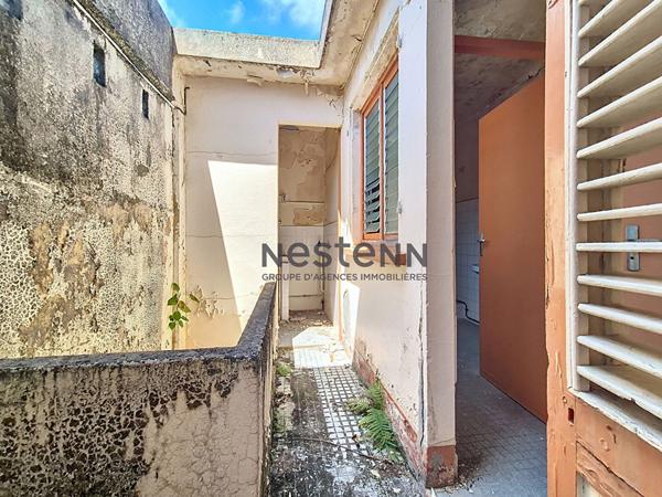 A VENDRE IMMEUBLE DE 3 LOGEMENTS A RENOVER SITUE A POINTE A PITRE