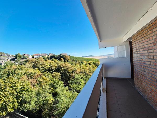 Appartement 3 pièces 69.90 m² au 7ème étage avec balcon et garage