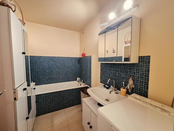 Appartement 3 pièces 69.90 m² au 7ème étage avec balcon et garage