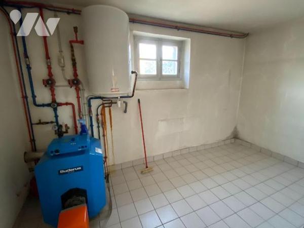 REILHAC, sur terrain de 459 m², maison d'habitation individuelle comprenant RDC garage, buander...