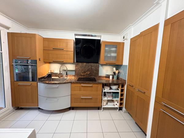 A louer - Coeur de ville - 3 pieces de 85m² en rez de jardin