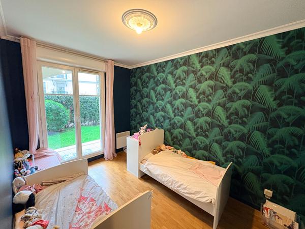 A louer - Coeur de ville - 3 pieces de 85m² en rez de jardin