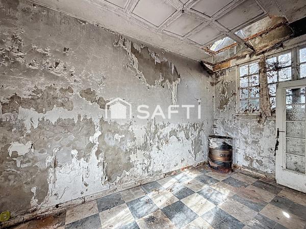 MAISON AVEC GROS TRAVAUX