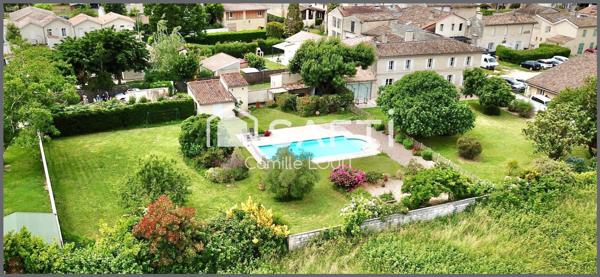 Maison en pierre au coeur d'Arveyres