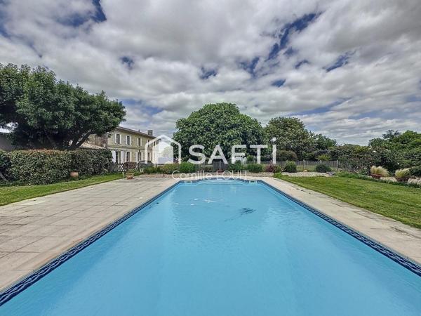 Maison en pierre au coeur d'Arveyres