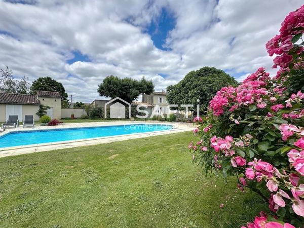 Maison en pierre au coeur d'Arveyres
