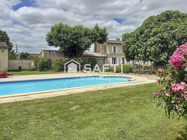 Maison en pierre au coeur d'Arveyres