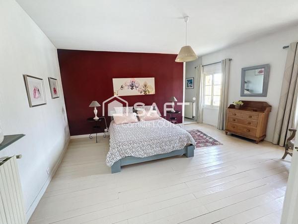 Maison en pierre au coeur d'Arveyres