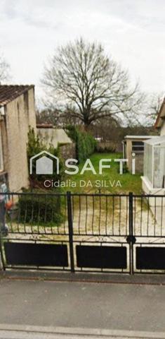 A VENDRE TERRAIN  constructible proche commodité