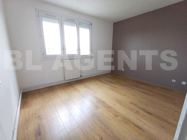 Appartement 65m² , 2 Ch. Lumineux. Résidence calme. Proche Commerces et Ecoles.