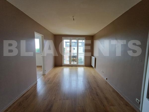 Appartement 65m² , 2 Ch. Lumineux. Résidence calme. Proche Commerces et Ecoles.