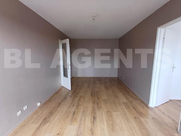 Appartement 65m² , 2 Ch. Lumineux. Résidence calme. Proche Commerces et Ecoles.