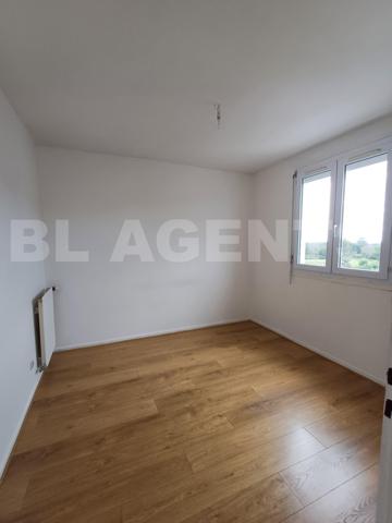 Appartement 65m² , 2 Ch. Lumineux. Résidence calme. Proche Commerces et Ecoles.