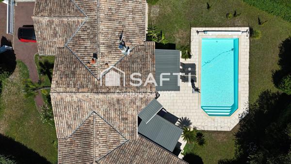 Superbe maison plain-pied baignée de lumière avec double garage et piscine
