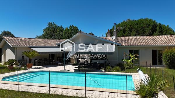 Superbe maison plain-pied baignée de lumière avec double garage et piscine