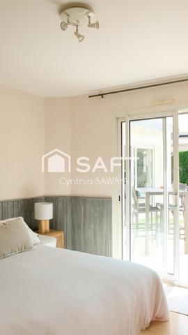 Superbe maison plain-pied baignée de lumière avec double garage et piscine