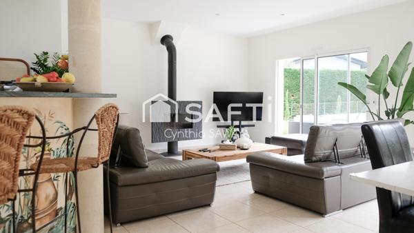 Superbe maison plain-pied baignée de lumière avec double garage et piscine