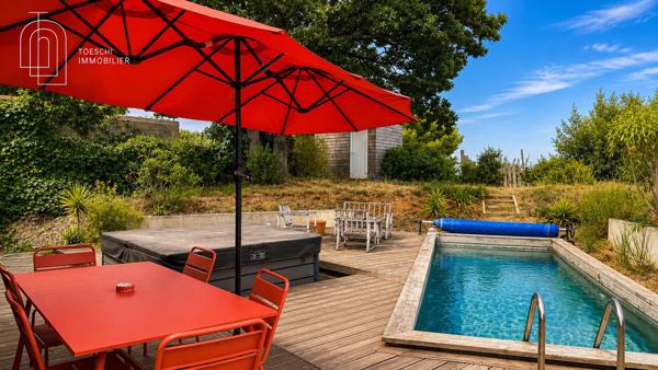 Toeschi Immobilier vous propose cette charmante maison en bois