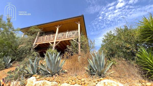 Toeschi Immobilier vous propose cette charmante maison en bois