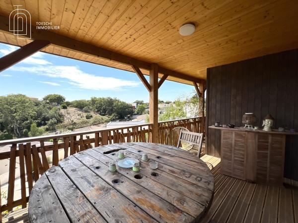 Toeschi Immobilier vous propose cette charmante maison en bois