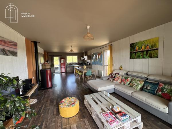 Toeschi Immobilier vous propose cette charmante maison en bois