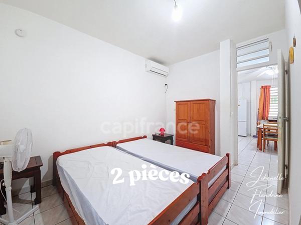 Propriété rare avec maison + 3 logements indépendants – 1850 m² constructible – Basse-Terre centre