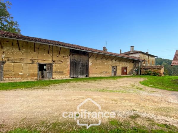 Propriété à vendre composée de 2 maisons - 11 pièces DOMMARTIN LES CUISEAUX (71) sur 1,1 hectare de terrain.