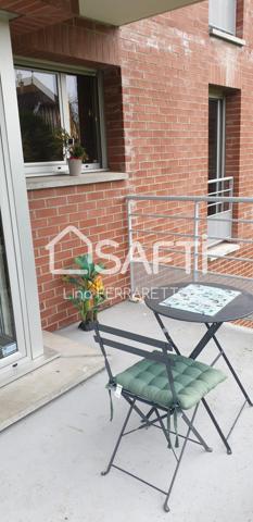 appartement 3 piéces 2 chambres + place de parking.