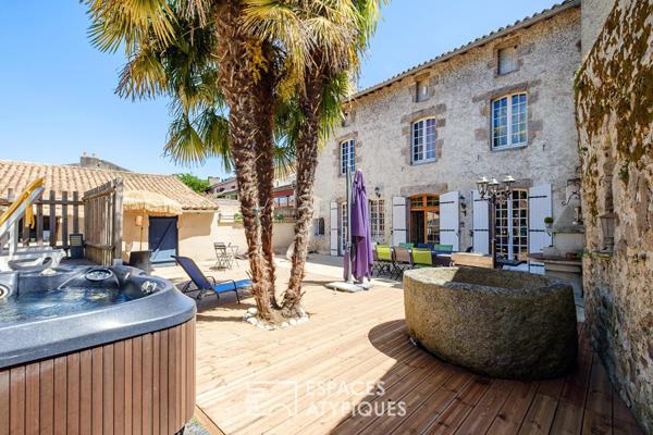 Maison familiale du XIVe avec vaste jardin et piscine en coeur de ville