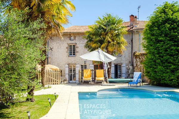 Maison familiale du XIVe avec vaste jardin et piscine en coeur de ville