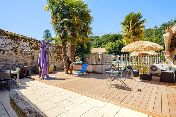 Maison familiale du XIVe avec vaste jardin et piscine en coeur de ville