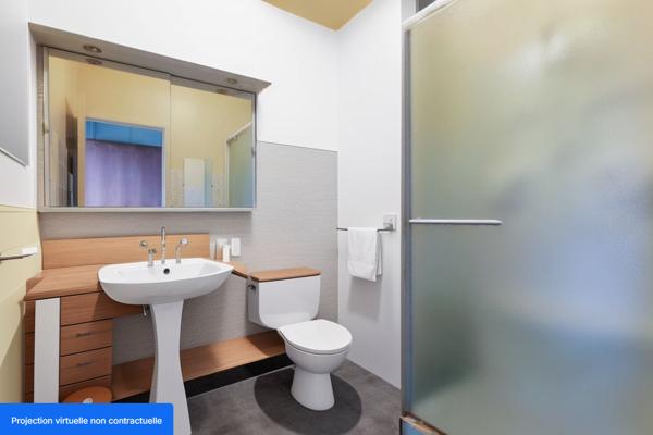 T1 dernier étage avec vue panoramique sur Nancy, cave et place de parking