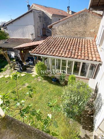 À vendre : maison familiale de 124 m² avec 4 chambres et jardin, à Sos, dans un environnement calme